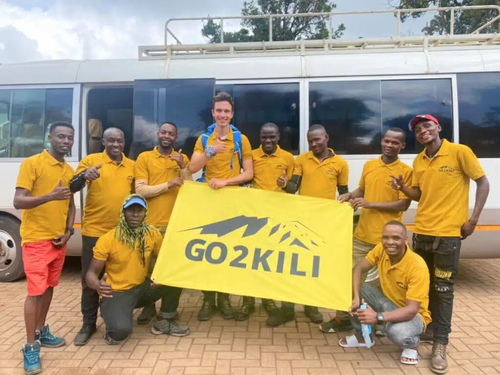 A Mount Kilimanjaro client with his crew